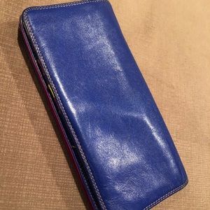 Blue wallet, card slots and zippered pockets.